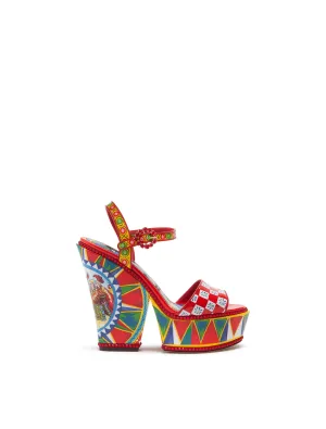 PATENT LEATHER SANDALS WITH WEDGE HEEL AND SICILIAN CARRETTO PRINT